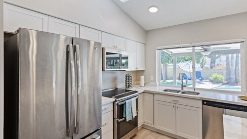 Modern and Stylish Remodeled 4 Bdrm w/ HTD Pool!