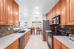 House (Multiple Bedrooms) | Private kitchen | Fridge, microwave, oven, blender