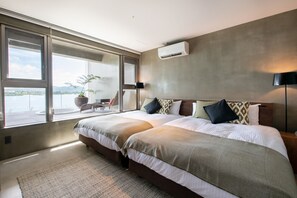 In-room safe, individually decorated, individually furnished, free WiFi - KOURI VILLA Indigo (Nakijin)