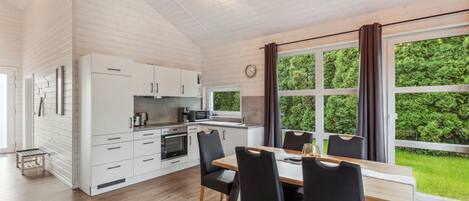 Fridge, stovetop, dishwasher, coffee/tea maker