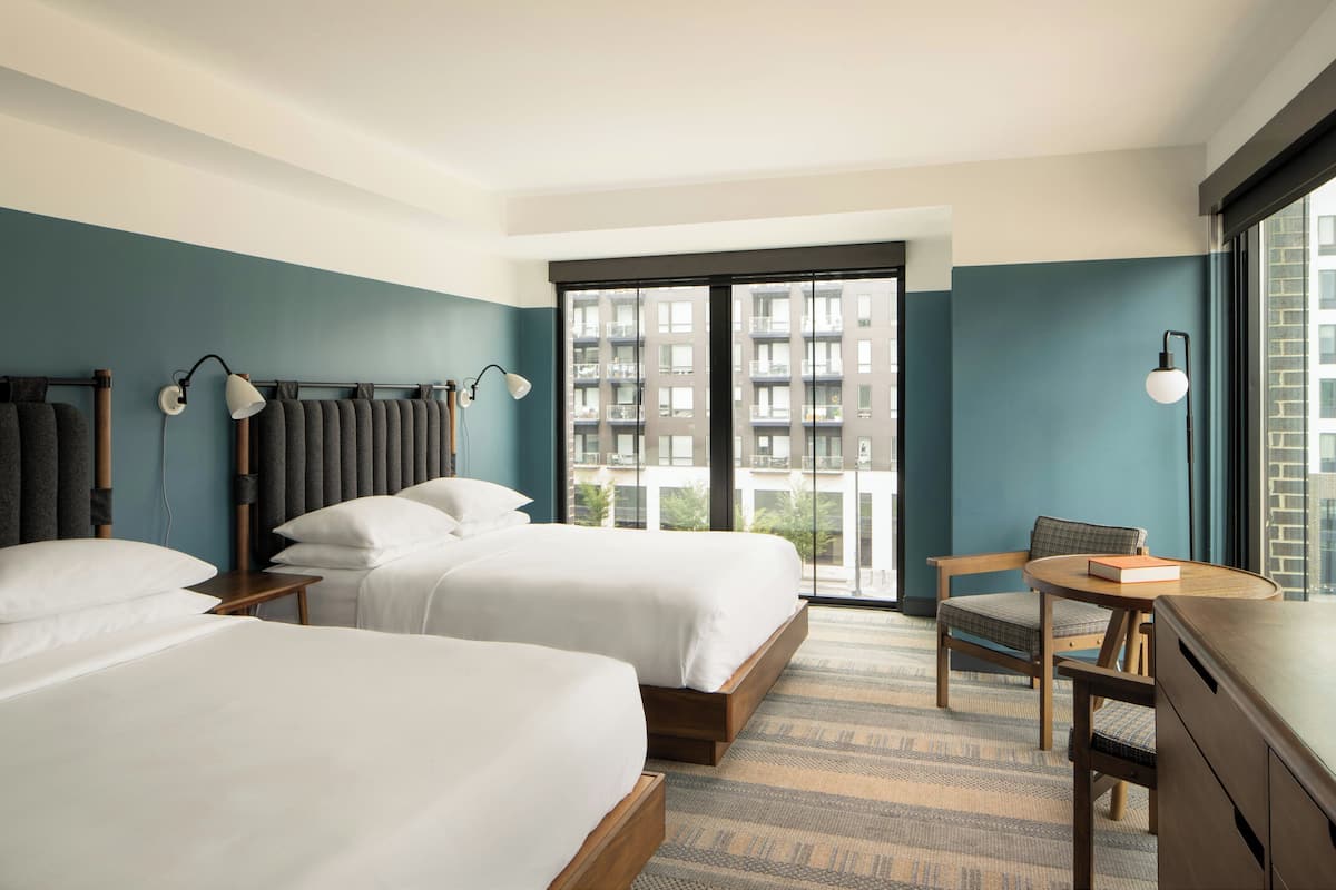 Premium bedding, down duvets, pillow-top beds, in-room safe
