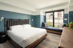 Premium bedding, down comforters, pillowtop beds, in-room safe