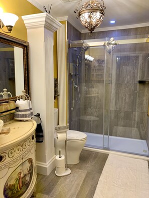 Shower, hair dryer, towels, soap