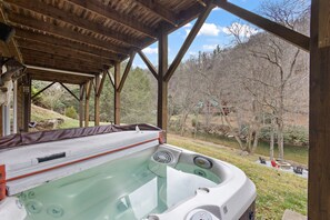 Outdoor spa tub - Riverfront Cabin with Hot Tub and Game Room (Boone)