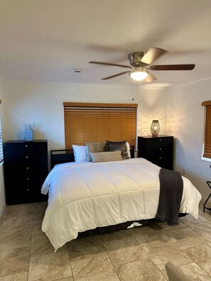 1 bedroom, desk, iron/ironing board, travel crib