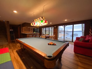 Games room - Peaceful 2 acre Lakefront Home in Duck Creek w/ Boat Dock, Game Room w/ Wet Bar (Afton)
