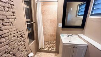 Shower, hair dryer, towels