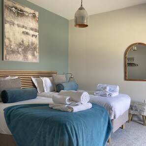 3 عدّة غرف نوم ومكواة/لوح كي وواي فاي مجانًا وملاءات أسرّة