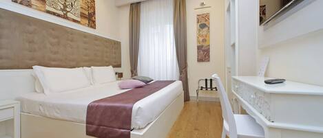 Down comforters, in-room safe, soundproofing, free WiFi