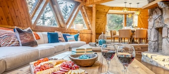 Architectural marvel w/firepit, hot tub, prime location, lounge & bar rooms!