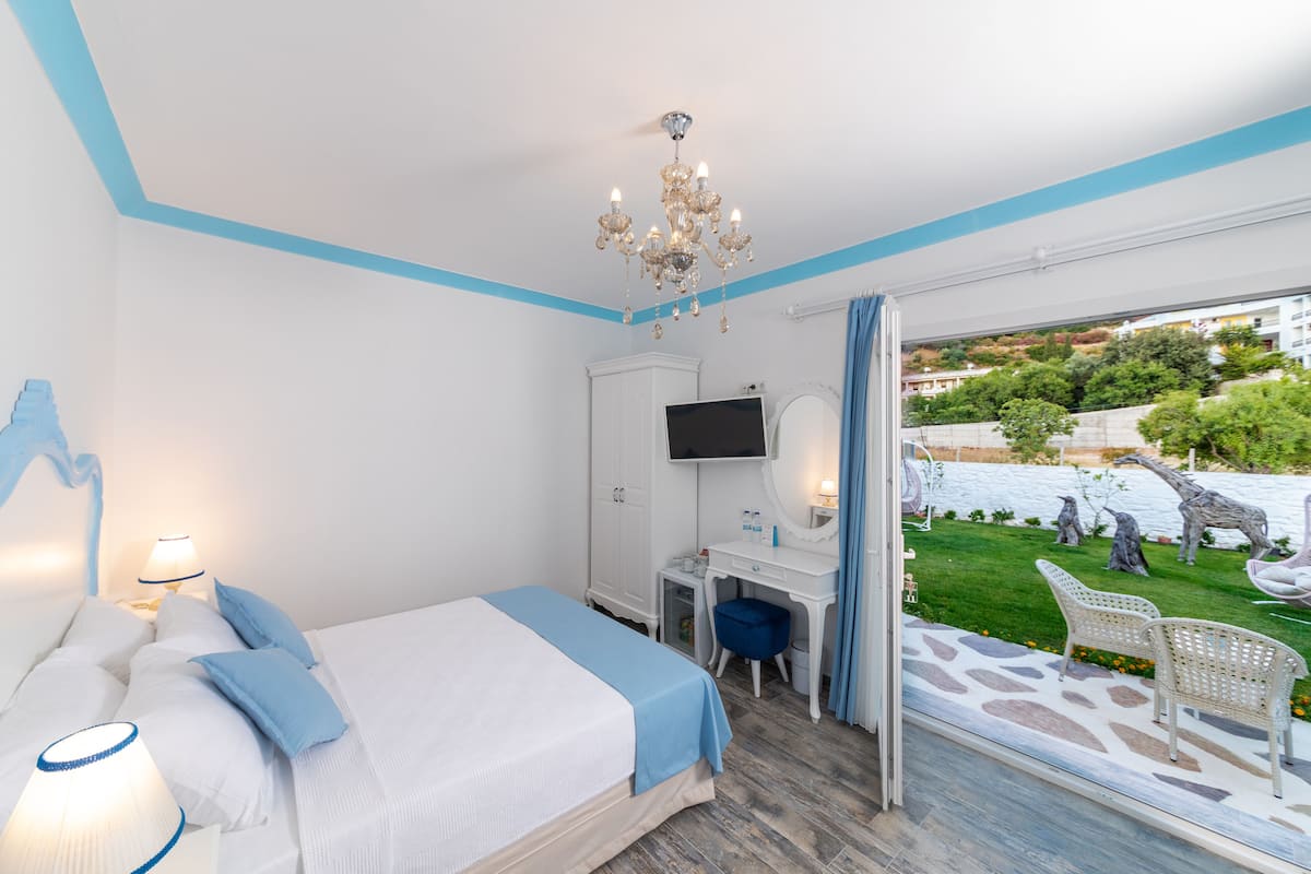 Exclusive Triple Room, Multiple Beds, Terrace, Garden View | Minibar, in-room safe, free WiFi, bed sheets