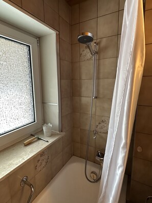 Hair dryer, towels, soap, shampoo