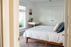 1 bedroom, desk, iron/ironing board, travel cot
