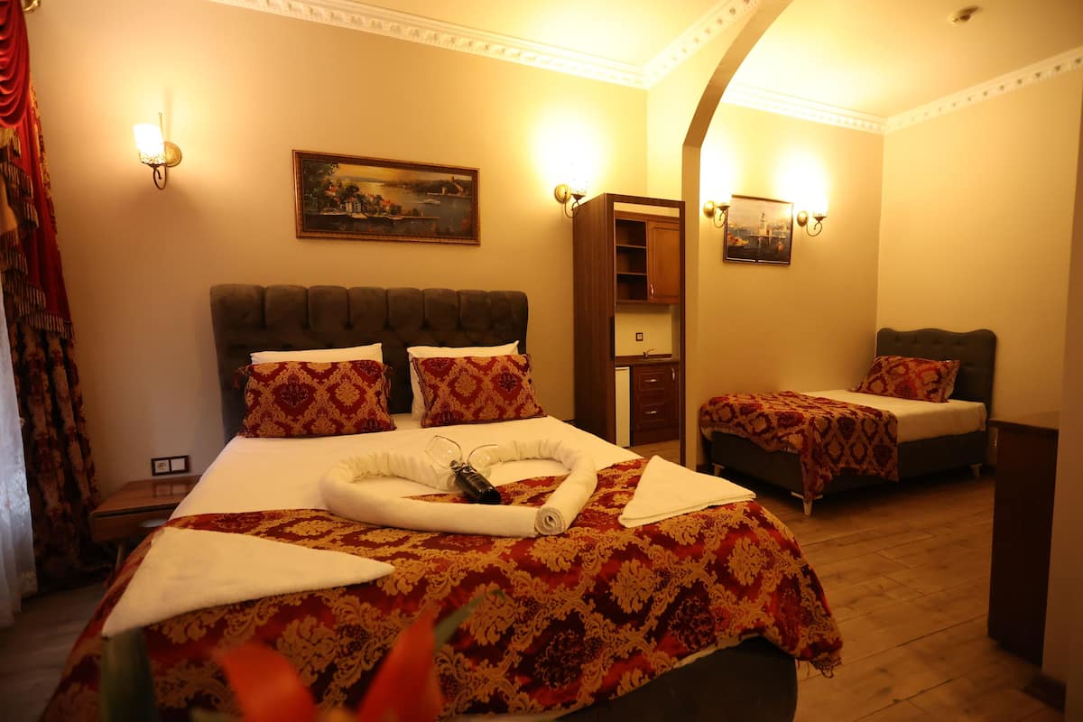 Superior Triple Room | 2 bedrooms, Egyptian cotton sheets, premium bedding, down duvets