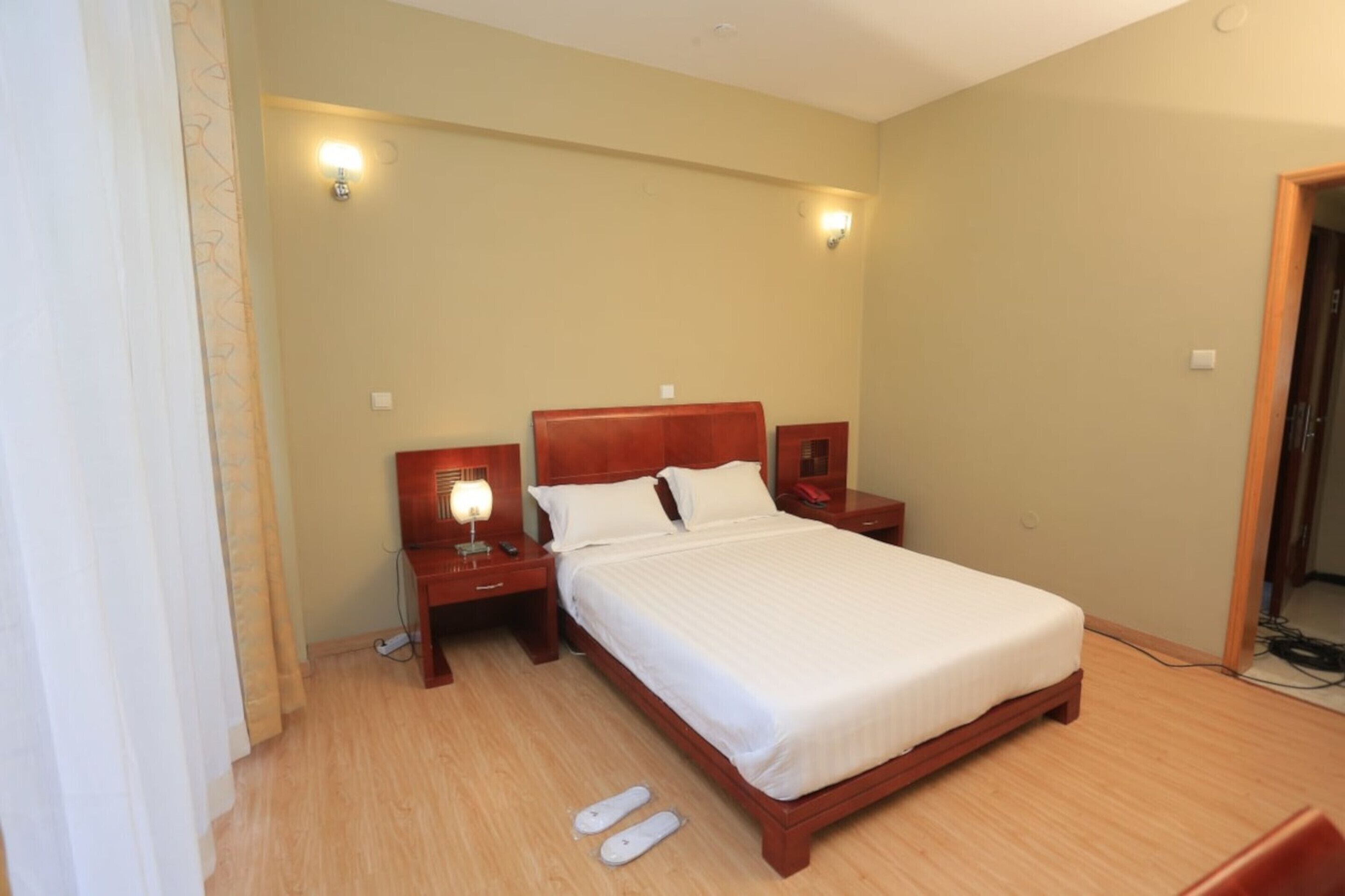 deluxe single room | in-room safe, desk, laptop workspace, iron/ironing board