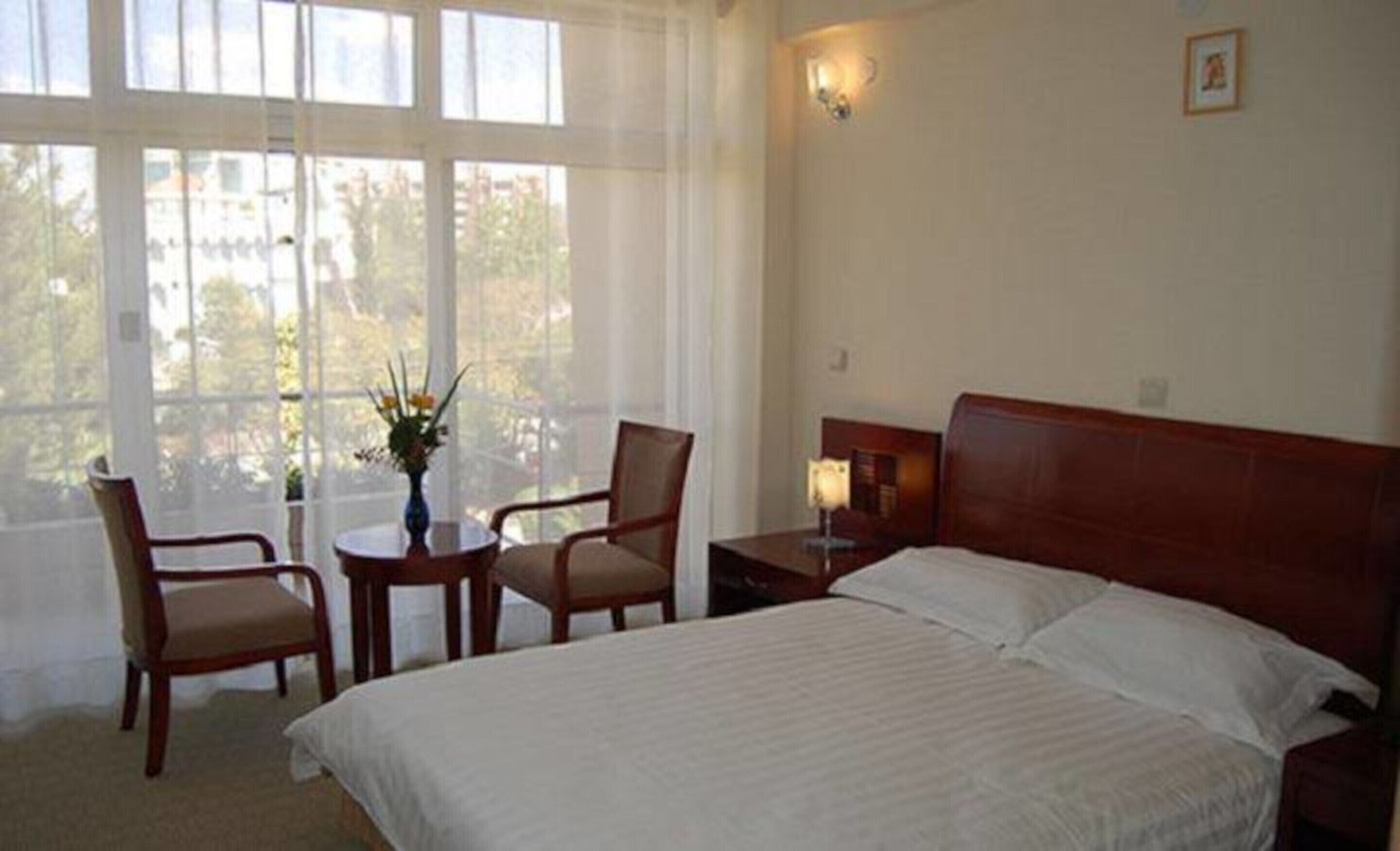 deluxe single room | in-room safe, desk, laptop workspace, iron/ironing board