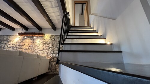 Dream apartment with a large heated pool and a beautiful garden