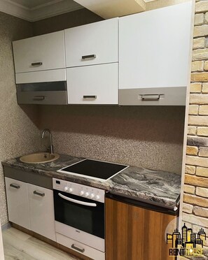 Fridge, microwave, oven, cookware/dishes/utensils