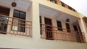 A building with multiple balconies and windows. - Roof Galaxy Hotel (Machakos)