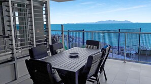 Outdoor dining - 1 Bright Point Apartment 4104 - Majestic Ocean Views (Nelly Bay)