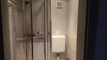 Shower, towels, toilet paper