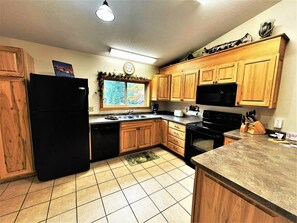 Fridge, microwave, oven, stovetop - Red Pines -  Elk Lake Condo #3 (Phillips)