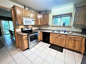 Fridge, microwave, oven, stovetop - Red Pines - Elk Lake Condo #6 (Phillips)