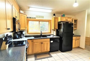 Fridge, microwave, oven, stovetop - Red Pines - Elk Lake Condo #4 (Phillips)