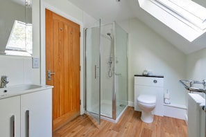 Bathtub, hair dryer, towels, soap