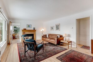 TV, fireplace, books