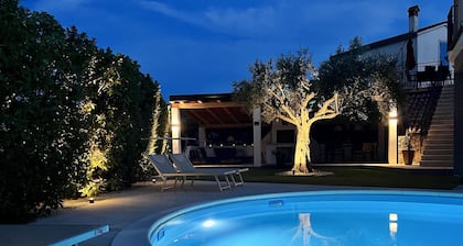 Romantic vacation apartment with large heated pool and beautiful garden