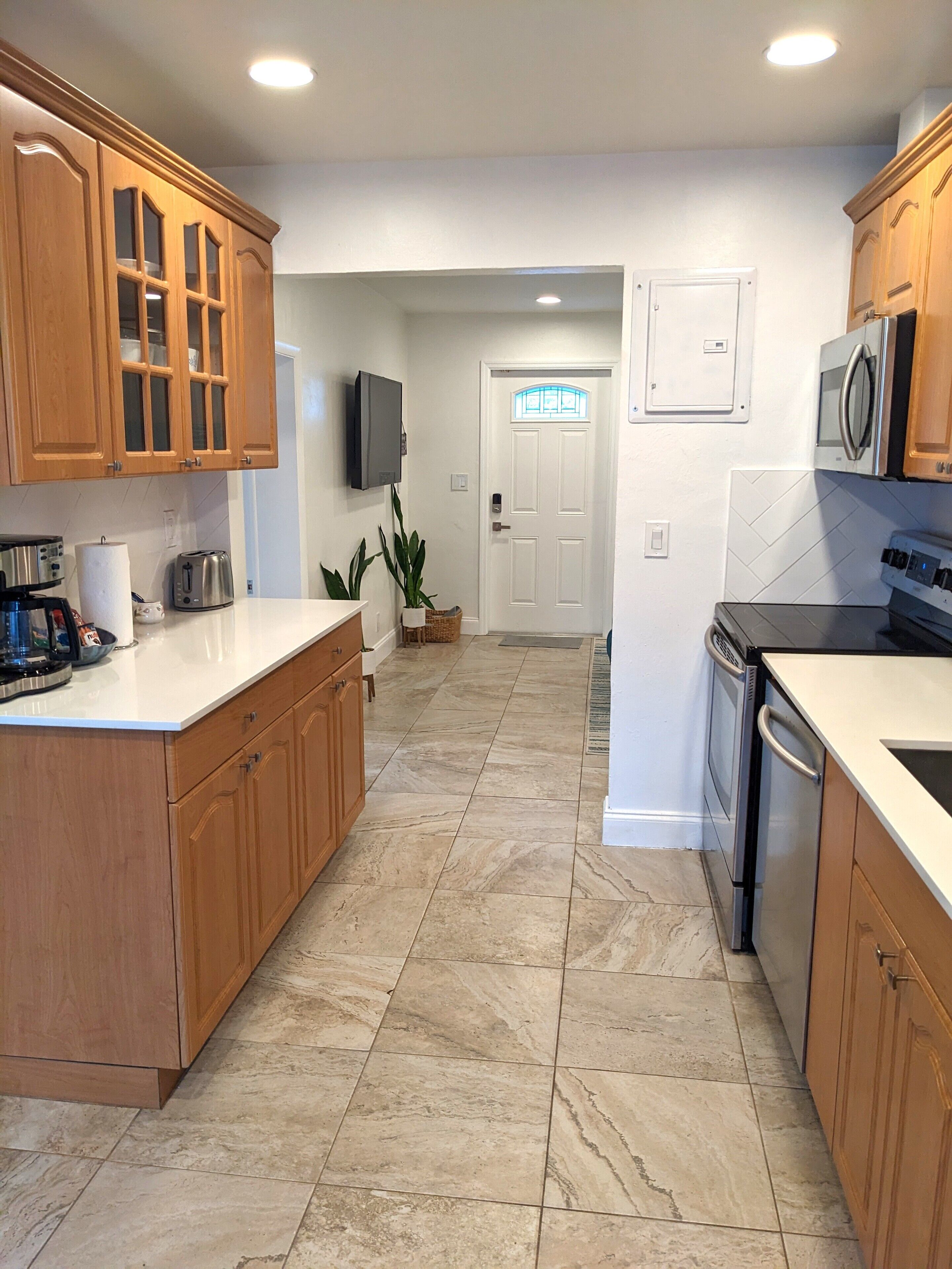 Refrigerador, microondas, horno y parrilla de estufa 