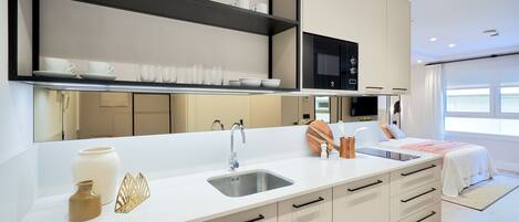 Fridge, microwave, coffee/tea maker, toaster