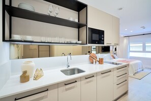 Fridge, microwave, coffee/tea maker, toaster
