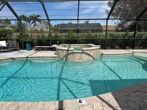 Outdoor pool, a heated pool - Updated Private Tropical Retreat with Heated Pool and Spa, Great Gathering Space (Bonita Springs)