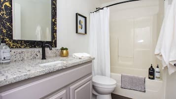 Hair dryer, towels, soap, shampoo
