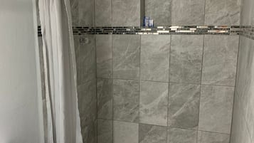 Shower, free toiletries, towels, soap