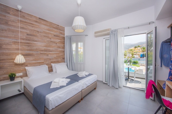 Superior Studio, Pool View | In-room safe, desk, iron/ironing board, free WiFi