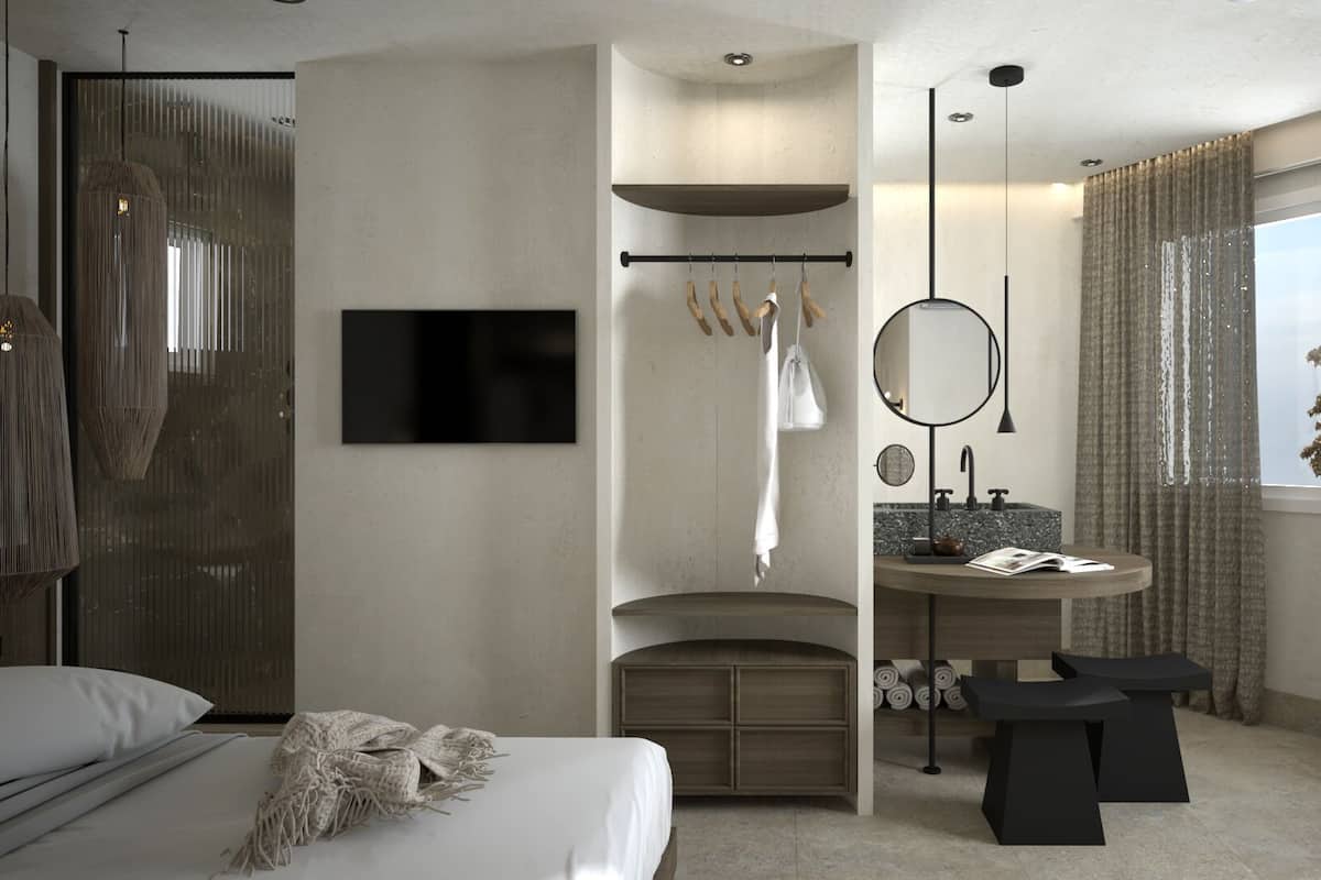 A modern hotel room with a bed, a vanity with a mirror, a hanging robe, and a large window with curtains.