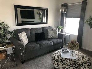 Smart TV, fireplace, books, video library - View of Lake Fenton with hot tub and fire place (Fenton)