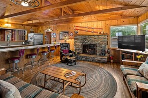 Smart TV, fireplace, books