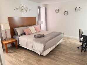 3 bedrooms, desk, iron/ironing board, travel cot