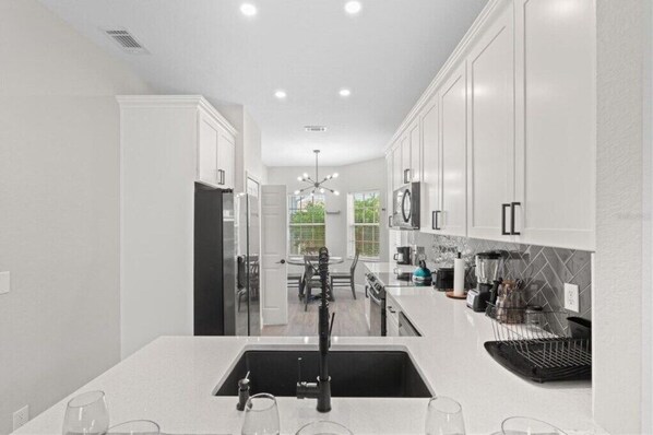 Fridge, microwave, oven, stovetop - Golf community home close to Disney with private pool 236 (Davenport)