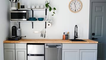 Fridge, microwave, dishwasher, coffee/tea maker