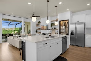 Coffee/tea maker, fridge, microwave, oven