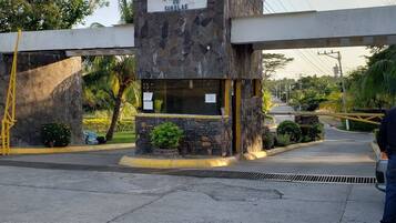 A stone building with a sign reading "ISLA DE SANBLAS".
