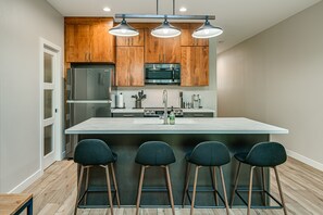 Fridge, microwave, oven, stovetop - Newly Built Downtown Townhome 2 (Bismarck)