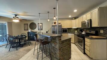 Apartment, 1 King Bed, Hot Tub, Garden View (579 Spindrift Ct Unit B) | Private kitchen | Fridge, microwave, oven, stovetop
