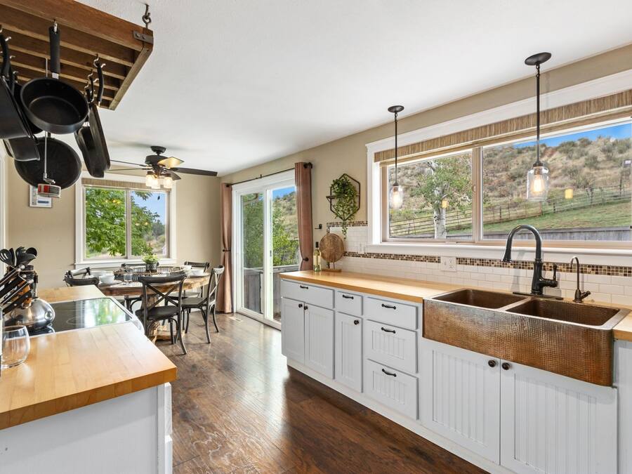 House, Multiple Beds, Patio, Garden View (4928 W. Eisenhower Blvd. Loveland) | Private kitchen | Fridge, microwave, oven, stovetop