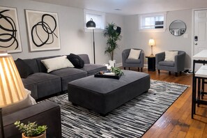 Apartment, Multiple Beds, Kitchen, Garden View (915 23rd St Lower) | Living area | 40-inch TV with digital channels - Charming Bungalow Next to UNC - Free Cruiser Bikes! (Greeley)